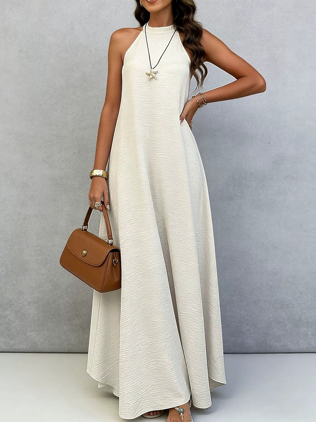Women’s sleeveless maxi dress with high standing collar, flowing A-line and crepe texture Mune Fashion