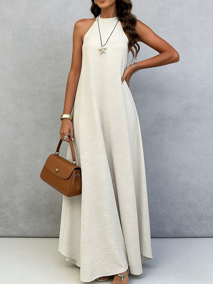 Women’s sleeveless maxi dress with high standing collar, flowing A-line and crepe texture Mune Fashion