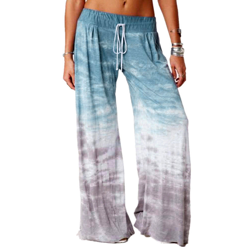 Ladies wide batik pants with drawstring, pleats, and side pockets Mune Fashion