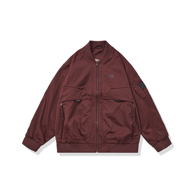 Unisex Short Cut Boxy Bomber Jacket in Utility Look with Front Zip, Flap Pockets and Ribbed Cuffs Mune Fashion