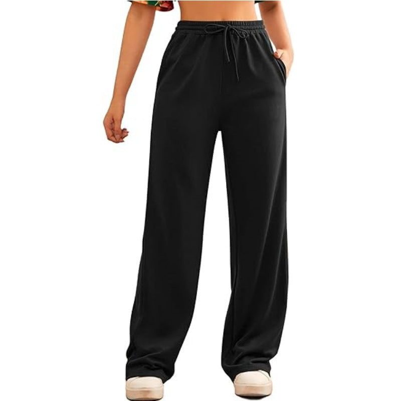 Women's flowing Relax palazzo pants with high comfort waistband, drawstring and side slip pockets Mune Fashion