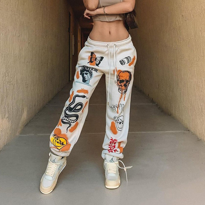 Women's graphic joggers with a high waistband, drawstring, and streetwear prints Mune Fashion
