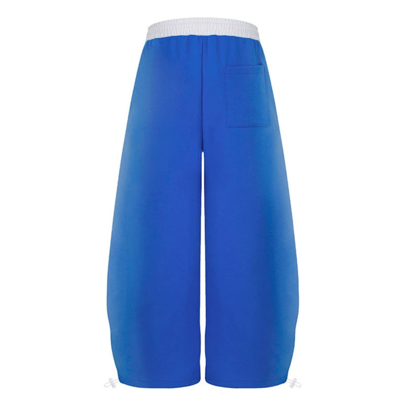Women's extra-wide culotte sweatpants in palazzo style with a high comfort waistband, drawstring, and gothic cross print Mune Fashion