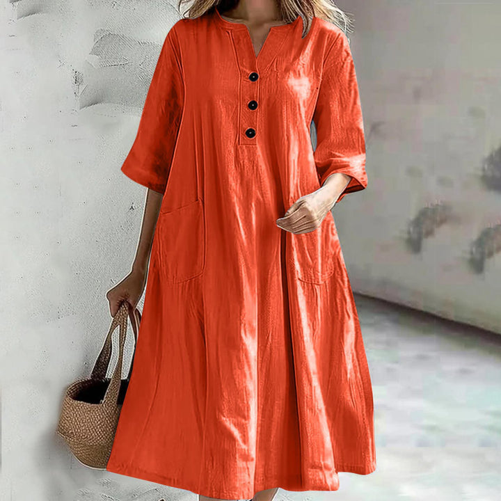 Women's casual falling A-line dress with V-neck button placket, 3/4 sleeves and patch pockets Mune Fashion
