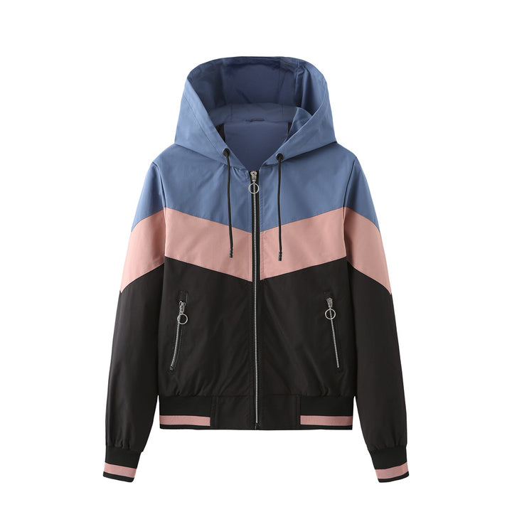 Women's lightweight windbreaker jacket with hood, block panel design, zippered pockets, and elastic hem Mune Fashion
