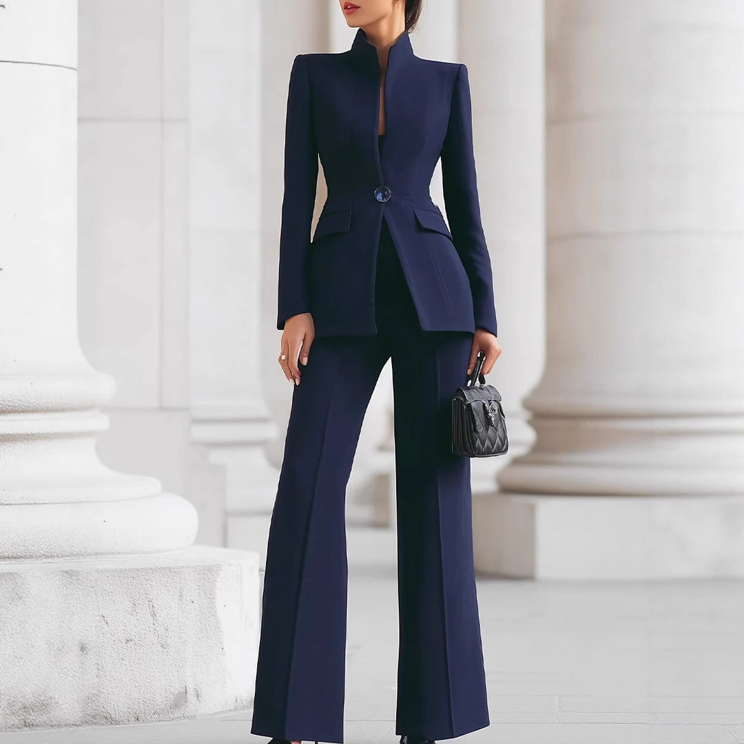 Women tailored suit with stand-up collar, fitted peplum and flared trousers Mune Fashion