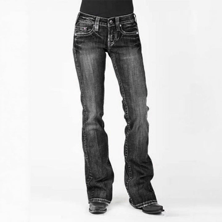 Ladies elegant bootcut jeans with a high waistband and subtle wash