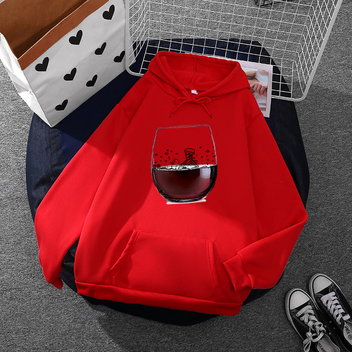 Women’s casual hoodie with photorealistic wine glass graphic, kangaroo pocket, and soft fleece Mune Fashion