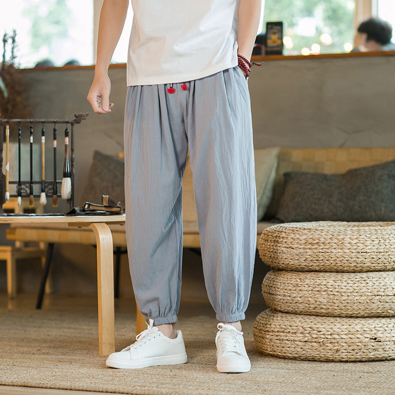 Men's loose harem pants with elastic waistband and decorative drawstring Mune Fashion