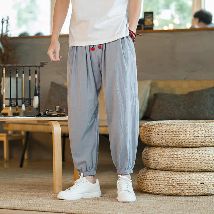 Men's loose harem pants with elastic waistband and decorative drawstring Mune Fashion