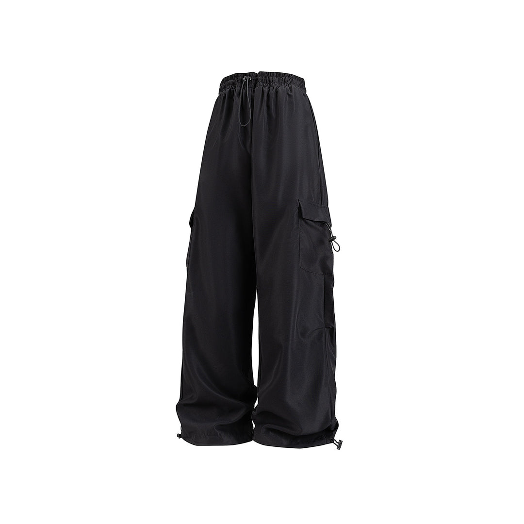 Men's wide technical cargo pants with drawstring waistband, multiple pockets and corded closure Drune