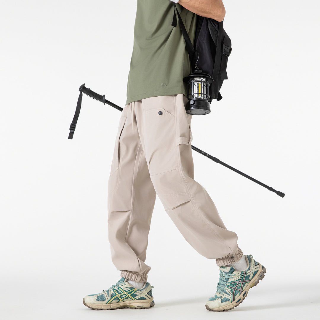 Men's utility cargo jogger pants with elastic waistband and oversized flap pockets