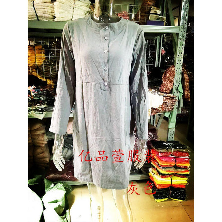 Women loose-fitting linen-look dress with three-quarter sleeves, button placket and side pockets Mune Fashion