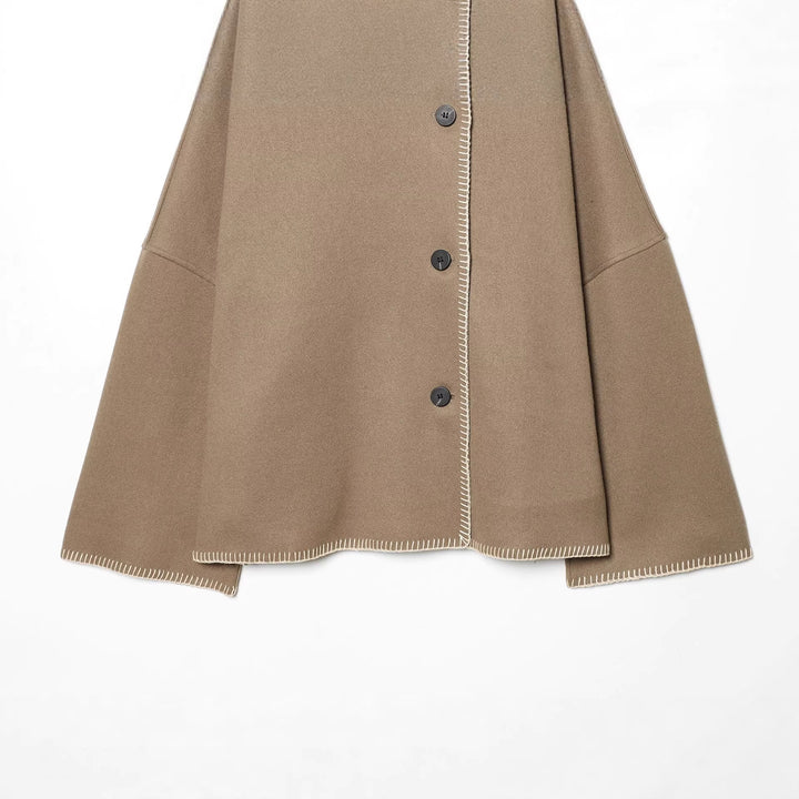 Women's cozy wool cape with high stand-up collar, asymmetrical button placket and decorative seam Mune Fashion