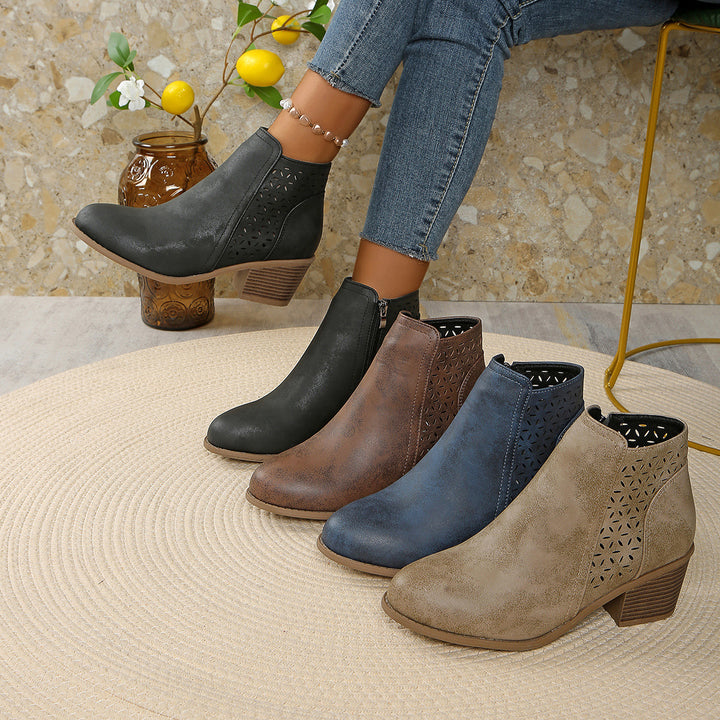 Women's ankle-high ankle boots with laser-cut perforation, side zipper, and mid-high block heel Mune Fashion
