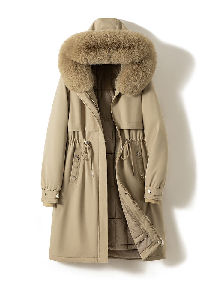 Women's longer water-repellent parka with voluminous faux fur hood, adjustable drawstring waist, and quilted thermal inner jacket Mune Fashion
