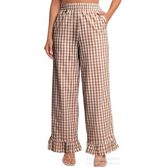 Women's palazzo pants with elastic waistband, side pockets, and ruffled hem Mune Fashion