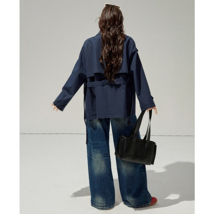 Ladies short trench coat with a flattering belt and double-breasted button placket Mune Fashion