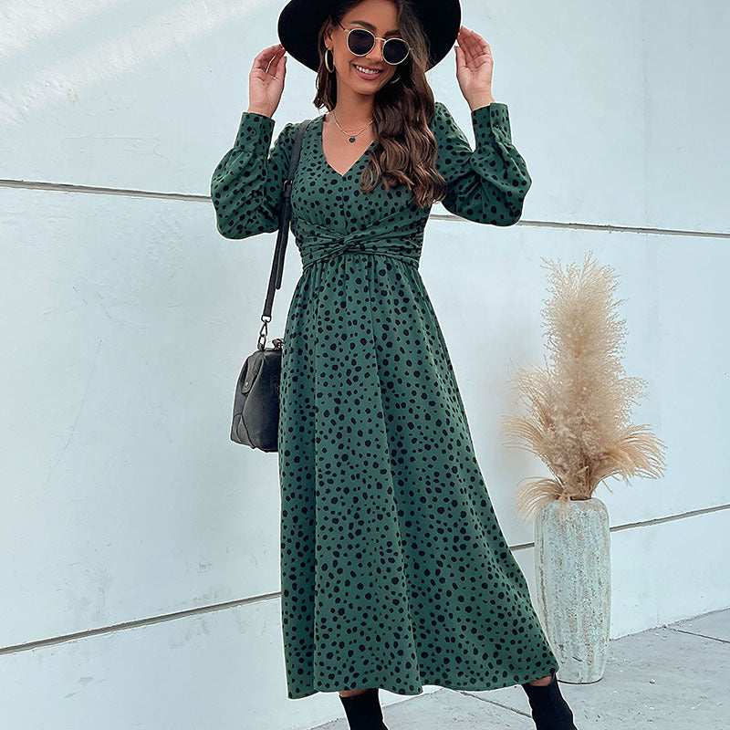 Women's midi dress in retro polka dot design with wrap look, V-neck and tailored tie belt Mune Fashion