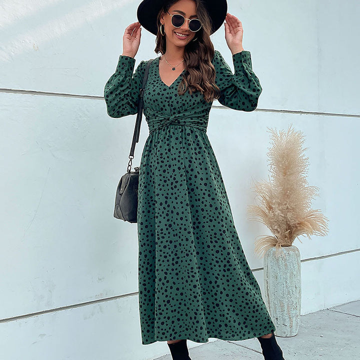 Women's midi dress in retro polka dot design with wrap look, V-neck and tailored tie belt Mune Fashion