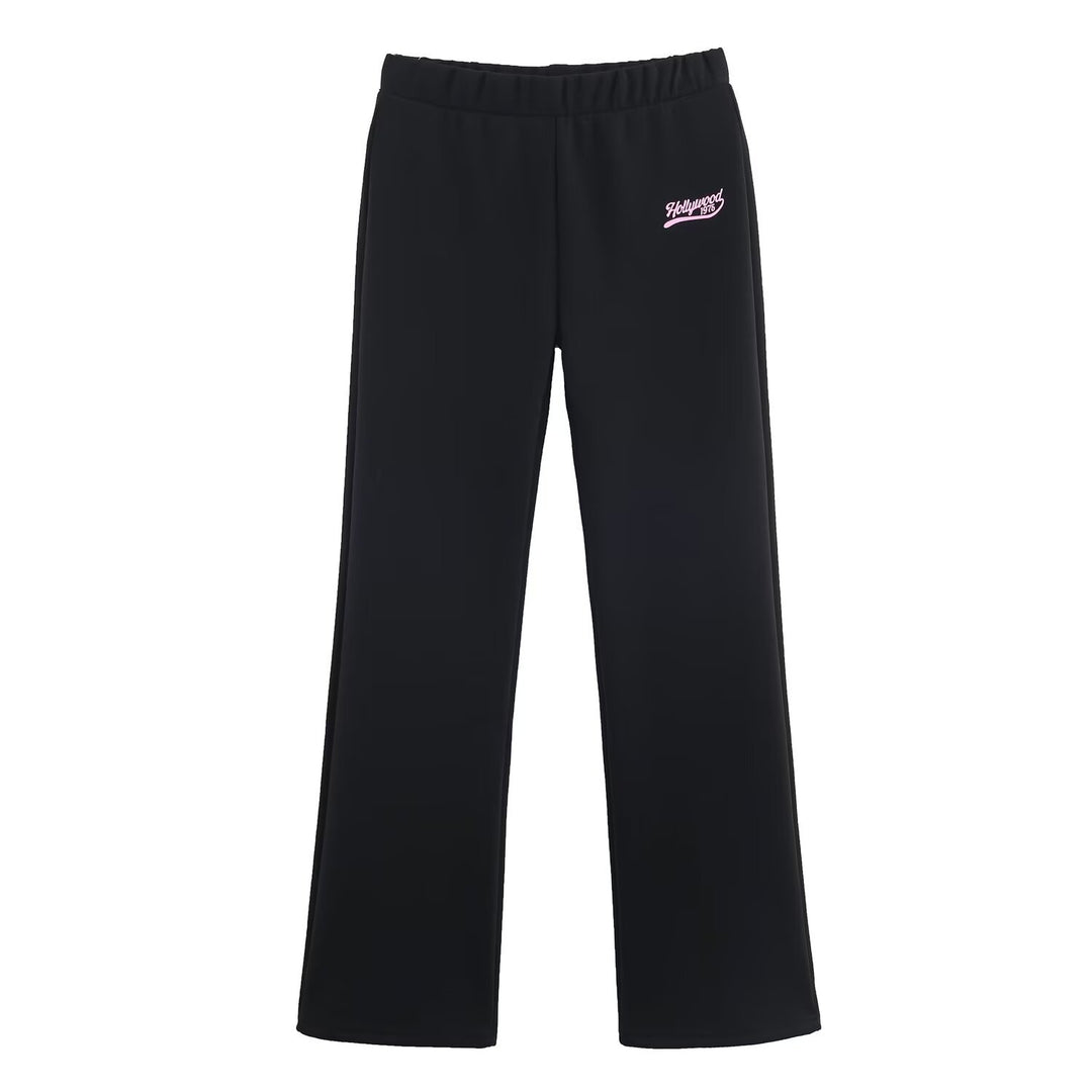 Women's loosely cut jersey casual pants with wide legs, elastic waistband, and retro logo Mune Fashion