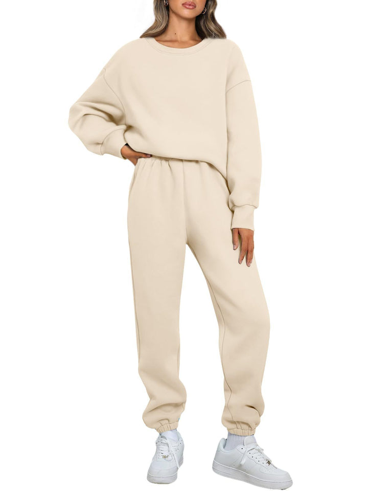 Women two-piece comfort loungewear set with oversized round neck, high-cut jogging pants and elastic ankle cuff Mune Fashion