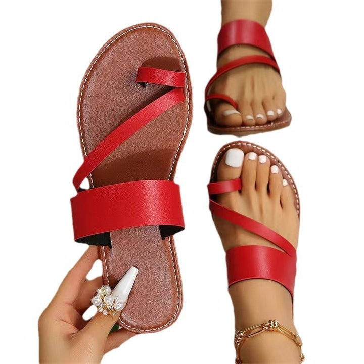 Women's flat faux leather thong sandal with crisscross straps and padded comfort footbed Mune Fashion