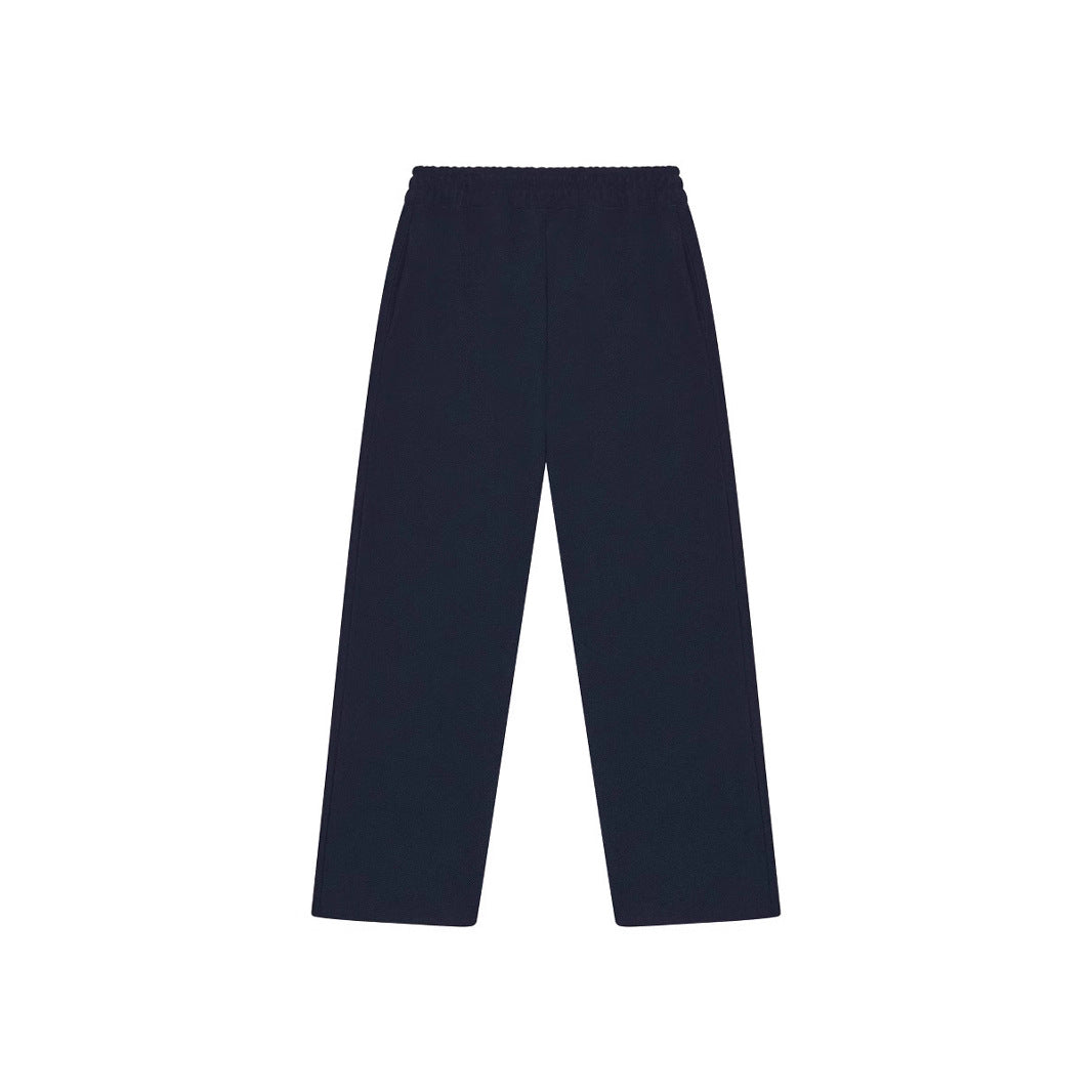Unisex straight-cut jogging pants with a high elastic waistband and side inset pockets Mune Fashion