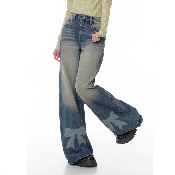 Women's high-waisted Palazzo pants made of denim with extra wide leg and bow print Mune Fashion