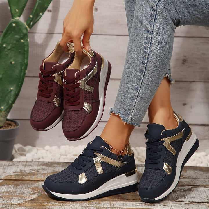 Ladies sporty wedge sneakers with padded memory footbed and elegant metallic accents Mune Fashion