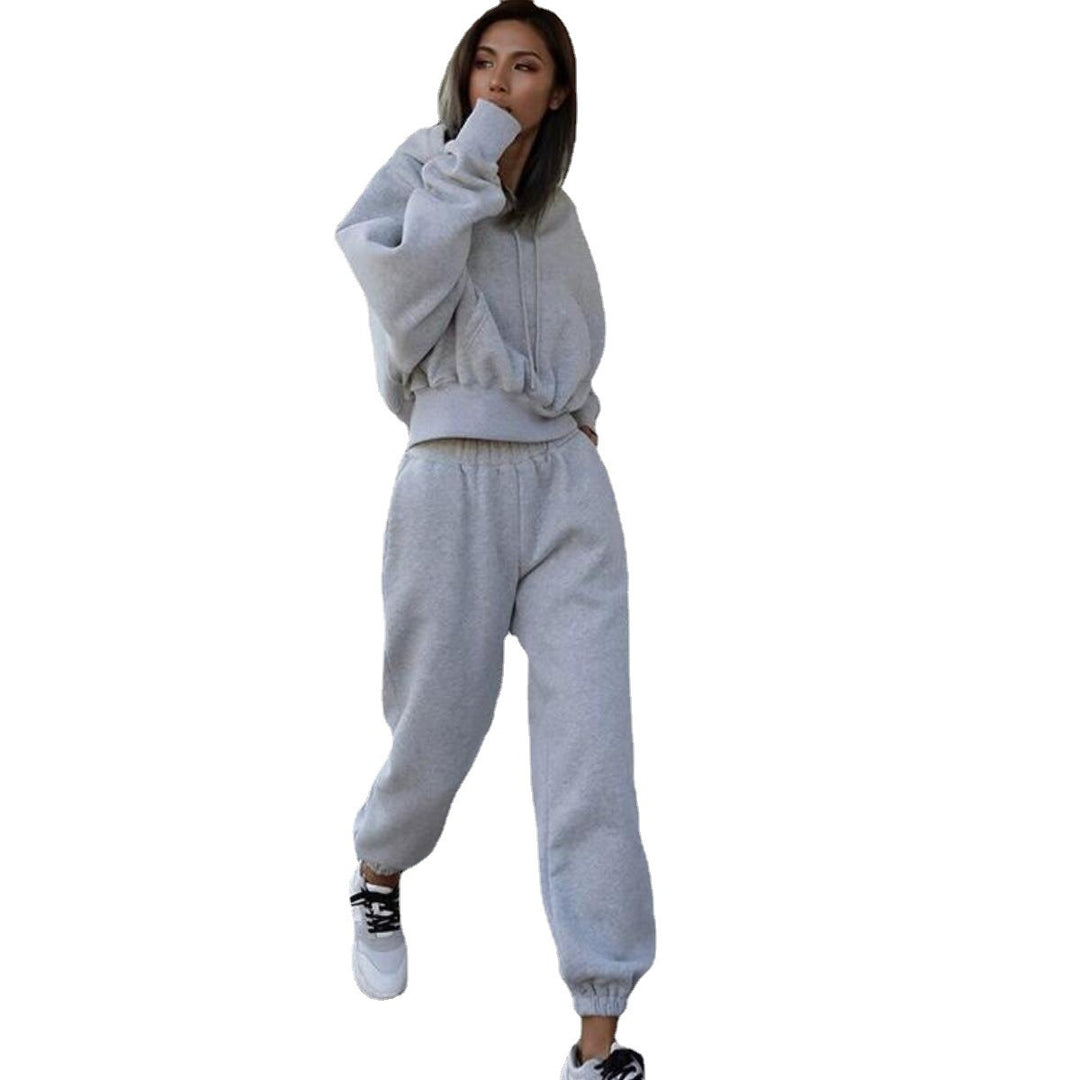 Women's short oversized hoodie set with elastic high-waist joggers made of cotton fleece Mune Fashion