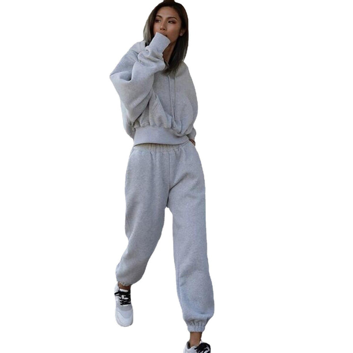 Women's short oversized hoodie set with elastic high-waist joggers made of cotton fleece Mune Fashion