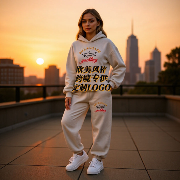 Women's oversized hoodie and jogger set with hood, kangaroo pocket, and ribbed cuffs Mune Fashion