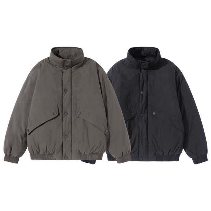Unisex Short-cut quilted boxy blouson jacket with high stand-up collar and utility flap pockets Mune Fashion