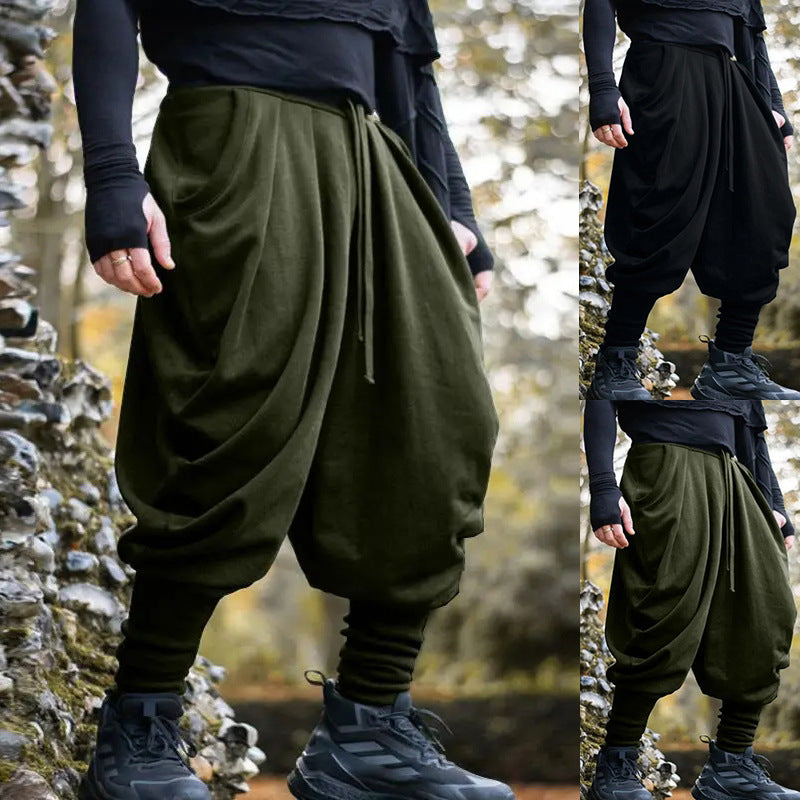 Men's avant-garde harem pants with wrap front, elastic waistband, and slim ankles Mune Fashion