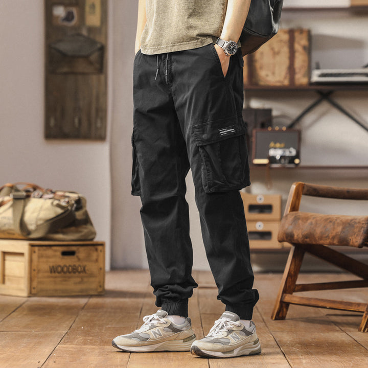 Herren Cargo-Jogginghose im Utility-Style mit verstärkten Klappentaschen und elastischem Saum Mune Fashion