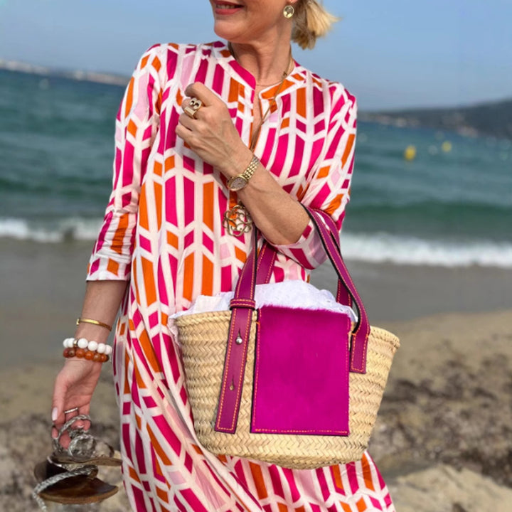 Women's flowing maxi dress with graphic all-over print, V-neck and three-quarter sleeves Mune Fashion