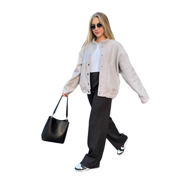 Women's teddy fleece bomber jacket in boxy cut with snap button closure and patch pockets Mune Fashion