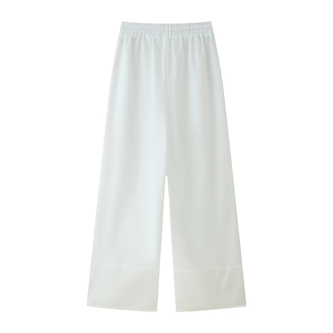 Ladies nan lightweight culotte pants with high elastic waistband, adjustable drawstring, side pockets, and embroidered hem Mune Fashion