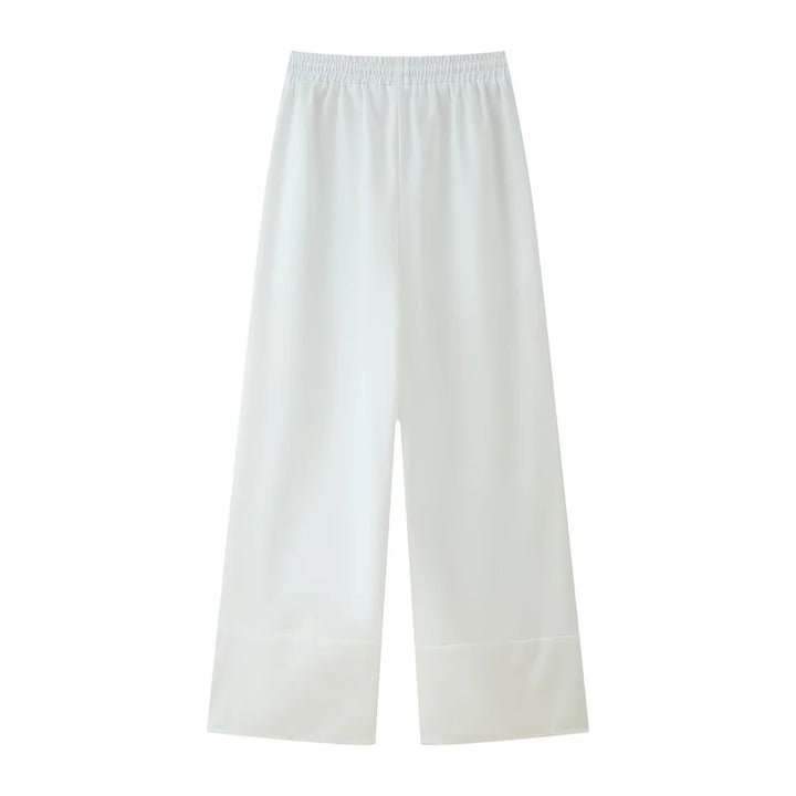 Ladies nan lightweight culotte pants with high elastic waistband, adjustable drawstring, side pockets, and embroidered hem Mune Fashion