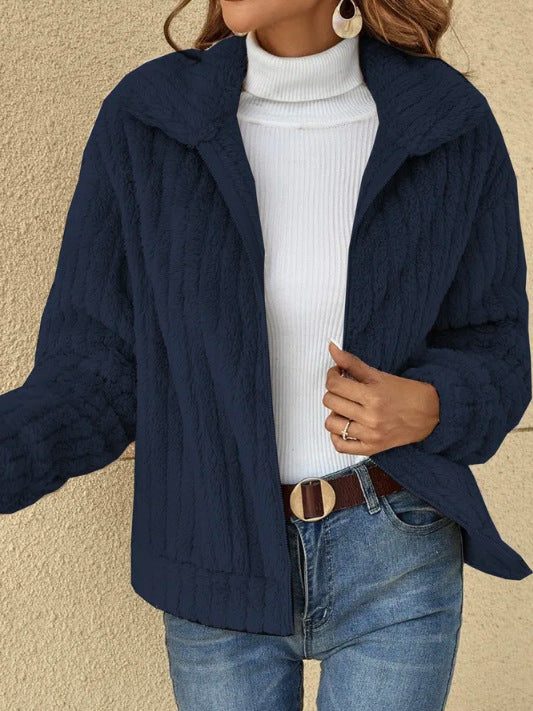 Ladies' fluffy teddy jacket with full-length zipper, stand-up collar, and front pockets Mune Fashion