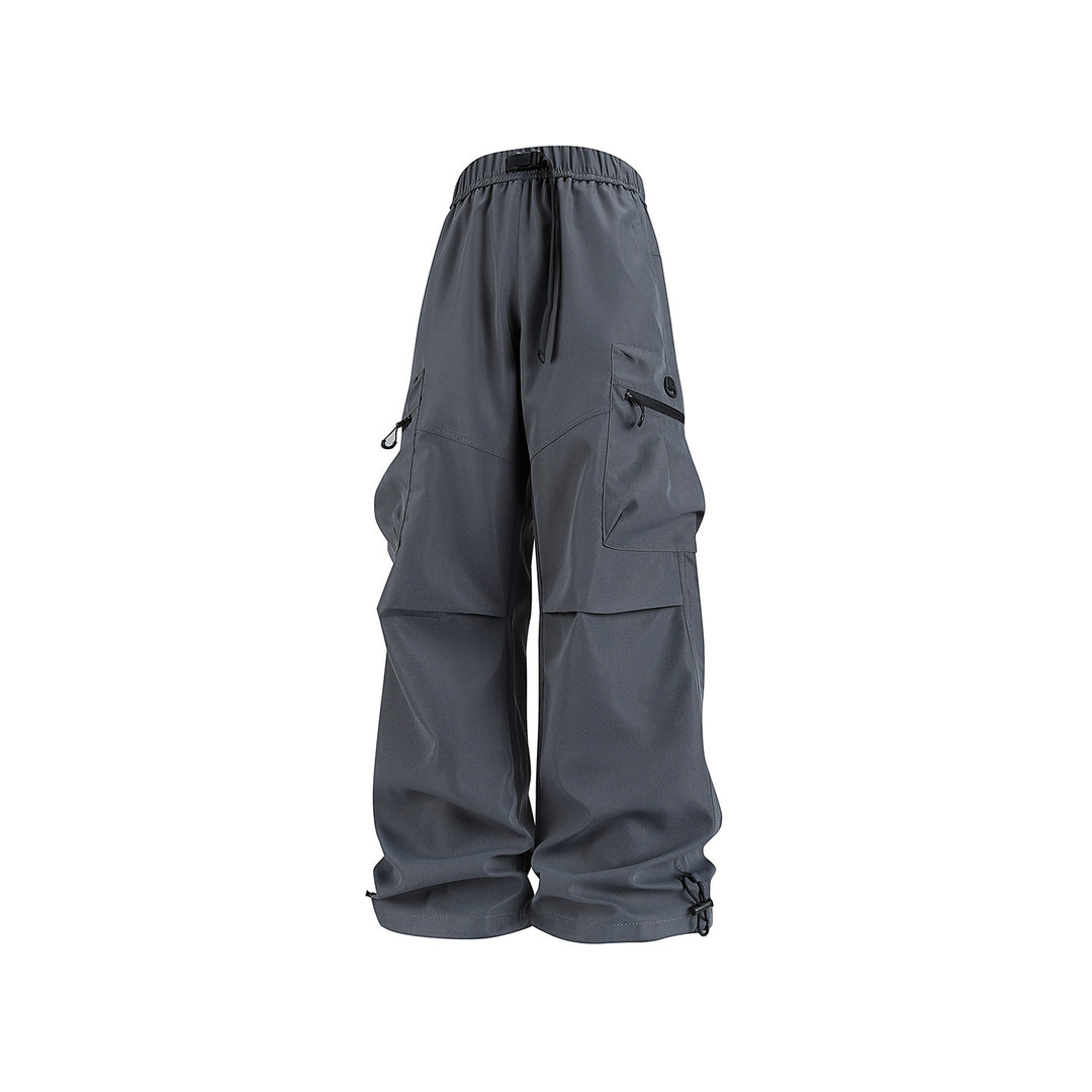 Men's wide technical cargo pants with multi pockets, drawstring and adjustable leg hems Drune