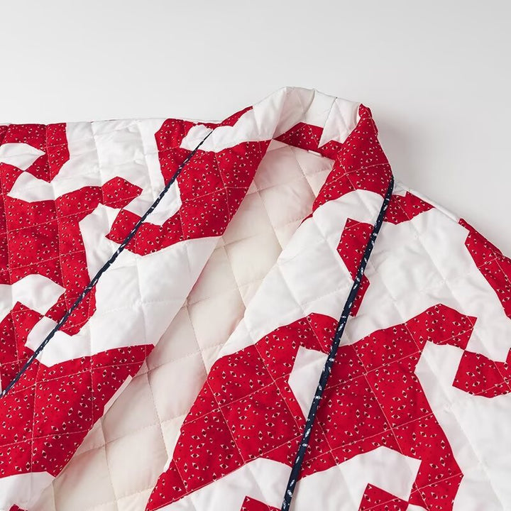 Women's quilted boxy kimono jacket with abstract all-over print and open front Mune Fashion