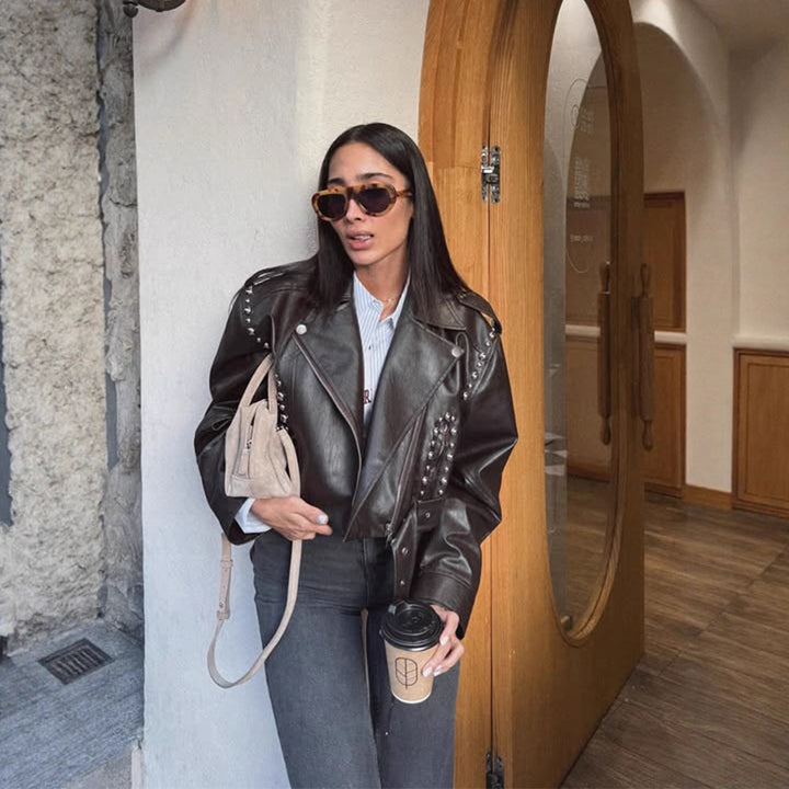 Women's Short Studded Biker Jacket Made of Faux Leather with Waist Belt Mune Fashion