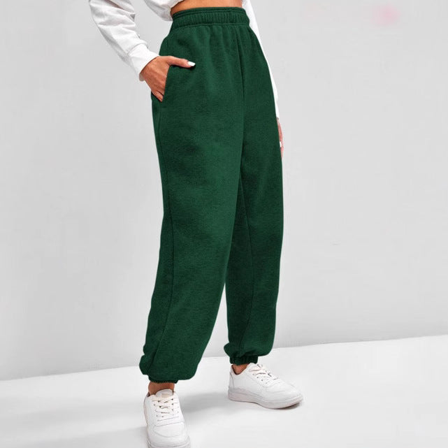 Women's high-cut Relax-Fit jogging pants with elastic waistband, side pockets, and gathered leg cuffs Mune Fashion