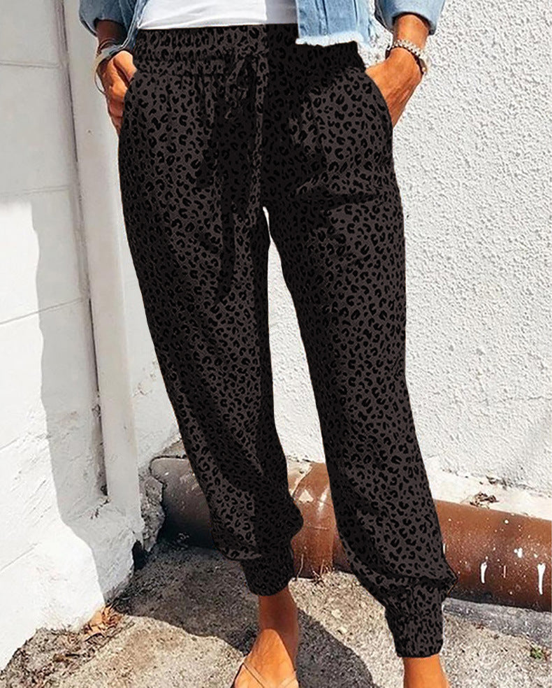 Ladies casual leopard print jogging pants with drawstring, side pockets, and elastic cuffs Mune Fashion