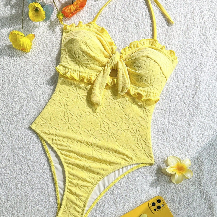 Women's swimsuit with playful ruffle design and trendy knot detail Mune Fashion