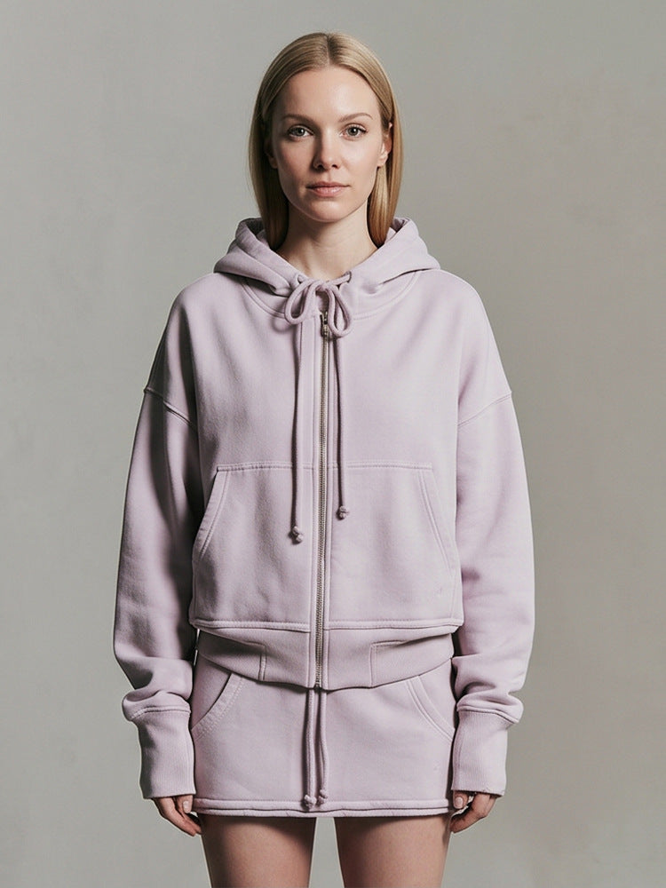 Ladies cropped hoodie sweatshirt with full zip, kangaroo pockets, and extended sleeve cuffs Mune Fashion