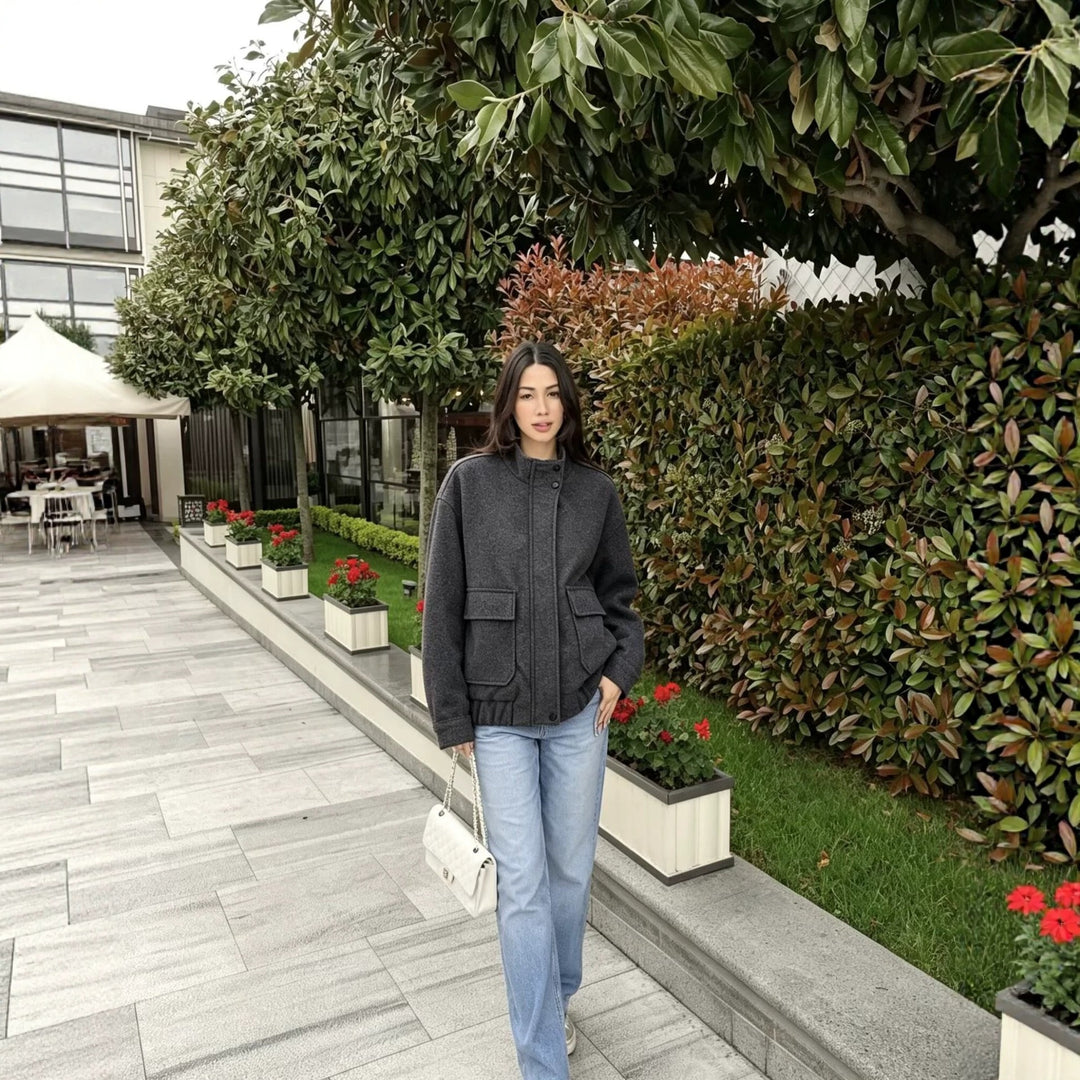 Women's wool blend blouson jacket with stand-up collar, large flap pockets, and elastic hem Mune Fashion