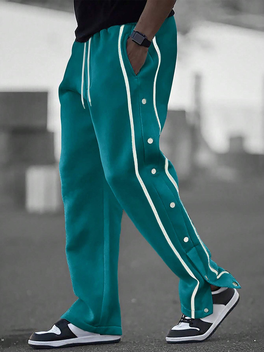 Men's casual training pants with side snap button placket, elastic waistband and contrasting piping Mune Fashion